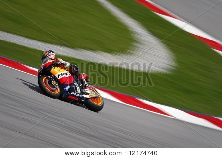 KUALA LUMPUR, Maleisië - 9 oktober: Andrea Dovizioso, Italië in actie op de kwalificatie van t