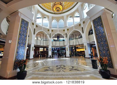 DUBAI UAE - JUNE 11: Central atrium of Mall of Dubai on June 11 2012 in Dubai. Mall of the Dubai is one of the biggest shopping centres in the world.