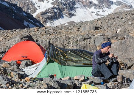 Female Climber Eating Ascetic Breakfast