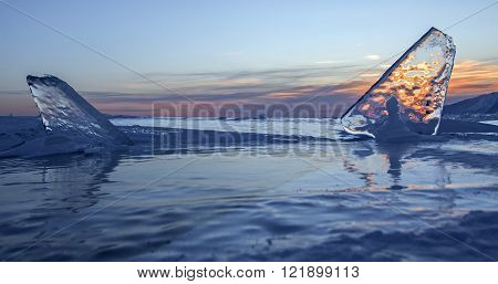 Transparent icicles at sunset.