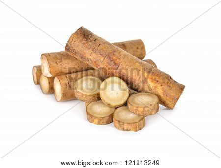 unpeeled Fresh Burdock roots on white background