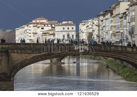 Florence, Italy - March 07: Ponte Santa Trinita Bridge Over The Arno River Shown On March 07, 2016 I
