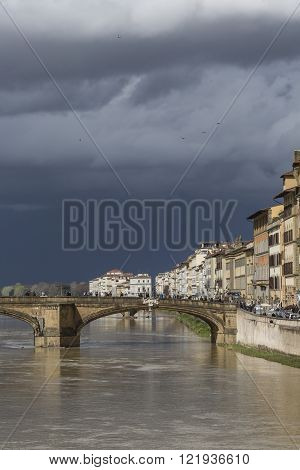 Florence, Italy - March 07: Ponte Santa Trinita Bridge Over The Arno River Shown On March 07, 2016 I