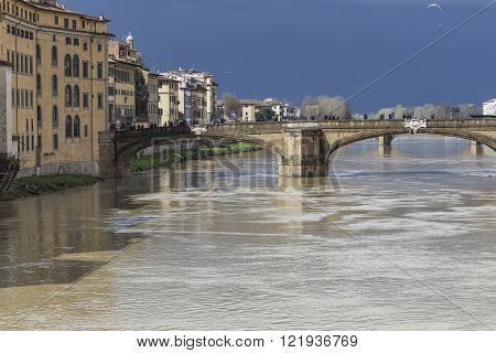 Florence, Italy - March 07: Ponte Santa Trinita Bridge Over The Arno River Shown On March 07, 2016 I
