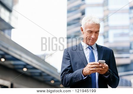 Portrait of confident businessman outdoors