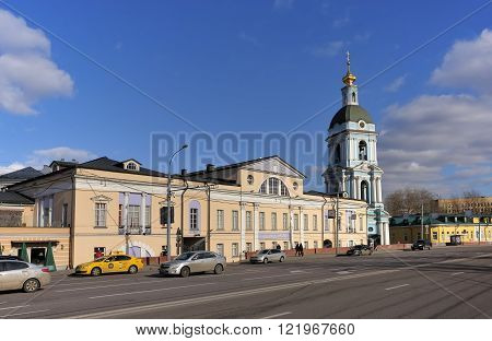 MOSCOW, RUSSIA - MARCH 14, 2016: View of the city estate Goncharov-Filippov and Bell tower Trinity in Serebryaniki Yauzskaya street 1/15