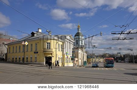 MOSCOW, RUSSIA - MARCH 14, 2016: View of the city estate Goncharov-Filippov and Bell tower Trinity in Serebryaniki Yauzskaya street 1/15