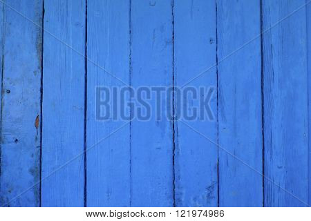 blue old door in the cracks for background