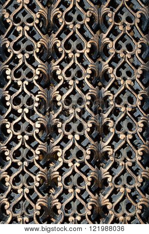 Decorative wooden carved teak grate. Myanmar (Burma)