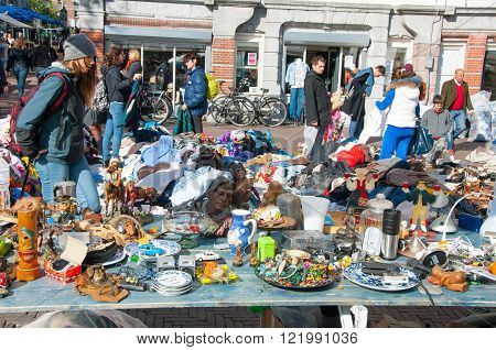 Amsterdam-April 30: Daily Flea market on Waterlooplein (Waterloo Square) merchants display curiosities and vintage for sale on April 30 2015 the Netherlands.
