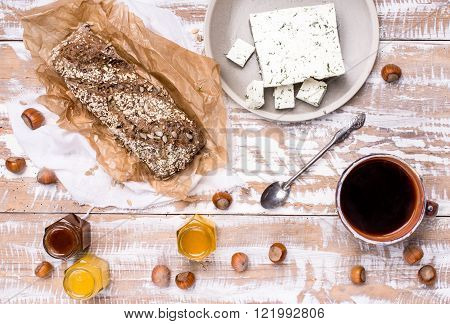 Morning Tea Bread With Seeds Huzelnuts And Cheese On Board