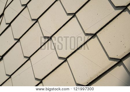 shingles as wall cladding on the facade of a house