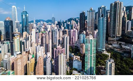 busy metropolis with high crowded buildings in Hong Kong