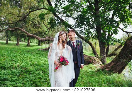 Sensual portrait of a young couple. Wedding photo outdoor.Happy wedding day