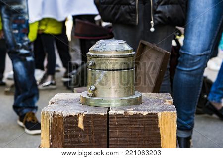 Coinage manually. Sledgehammer, anvil, used for minting coins.