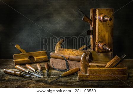 Still life with carpentry tools, bench planes of the joiner, wood carving chisel