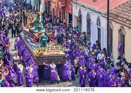 Antigua, Guatemala -  March 26, 2017: Lent procession in town with most famous Holy Week celebrations in Latin America