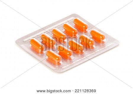 Plate of pills on a white background isolation