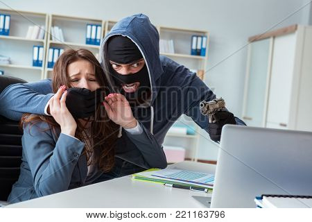 Criminal taking businesswoman as hostage in office