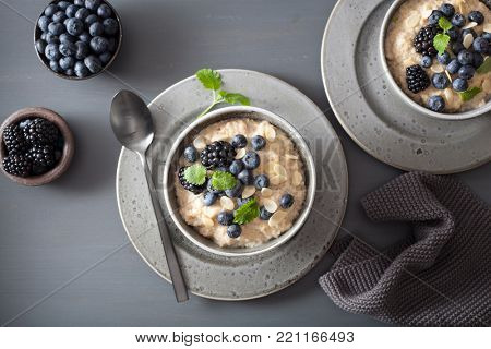 healthy breakfast steel cut oatmeal porridge with blueberry blackberry