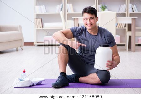 Man with food supplements in sports and healthy lifestyle concep