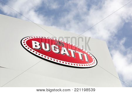 Geneva, Switzerland - October 1, 2017: Bugatti logo on a panel. Automobiles Bugatti is a French car manufacturer of high-performance automobiles, founded in 1909 in Molsheim, France
