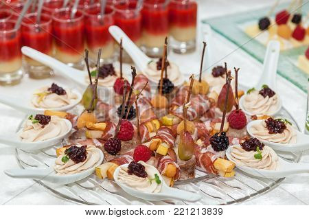 cheese sticks with bacon for a buffet table. cheese sticks with bacon