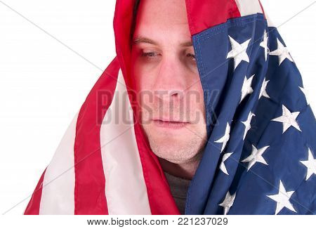 a man with a usa flag wrapped around him.