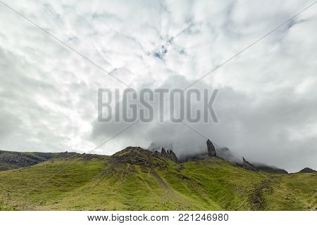 Mist Swirling Around The Old Man Of Storr On The Isle Of Skye In Scotland.