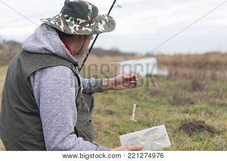 A man enjoys in the free time he spends himself on fishing