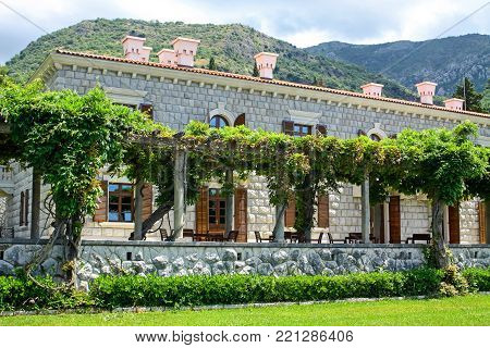 MILOCER, MONTENEGRO - JUNE 20, 2010: Villa Milocer, one of the most beautiful resorts of the Budva riviera surrounded by the shady park, Sveti Stefan, Montenegro