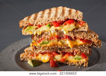 grilled cheese sandwich with avocado and tomato