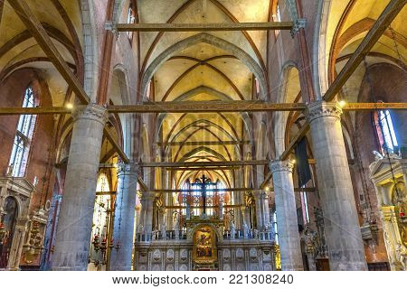 VENICE, iTALY - SEPTEMBER 21, 2017 Titian Assumption Virgin Mary Rise to Heaven  Painting Santa Maria Gloriosa de Frari Church San Polo Venice Italy.  Church completed mid 1400s.  Titian Painted Assumption Mary Rise to Heaven Painting in 1518