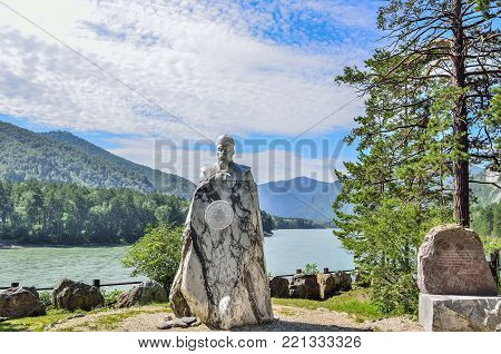 Turquoise Katun, Altai Republic, Russia - July 22, 2017: Marble monument to Nicholas Roerich - painter, philosopher-mystic, writer, traveler, on the picturesque bank of mountain river Katun