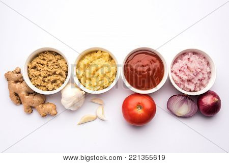 Ginger,  Garlic, onion and tomato paste or Sauce. Basic Indian food ingredients. Selective focus