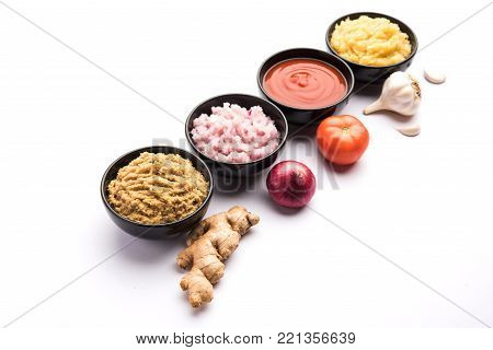 Ginger,  Garlic, onion and tomato paste or Sauce. Basic Indian food ingredients. Selective focus
