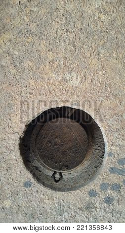Rusty metal with a large hole. The Texture Of The Metal. background..
