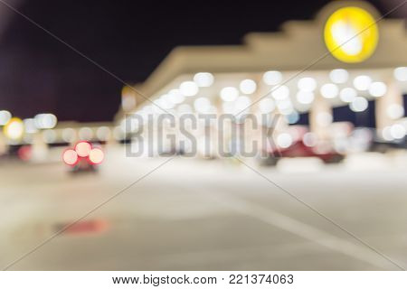 Blurred Gas Station At Night In Madisonville, Texas, Usa