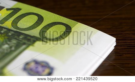 Counting One Hundred Euro Banknotes Close-up. Euro Banknotes Counting Close Up Black Background. Eur