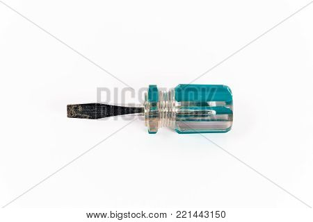 An old small screw driver isolated on white background