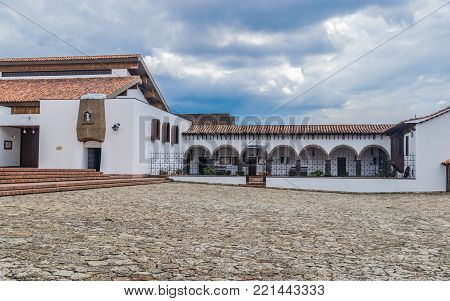 GUATAVITA CUNDINAMARCA, COLOMBIA - DECEMBER 26, 2017: Beautiful colonial architecture of the town's central park.
