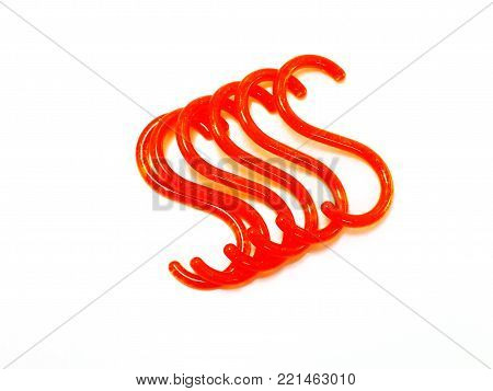 Orange S-shape Hooks Isolated On White Background