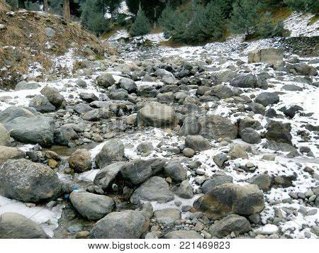 Natural Scene of Mountain rocks & snow fall