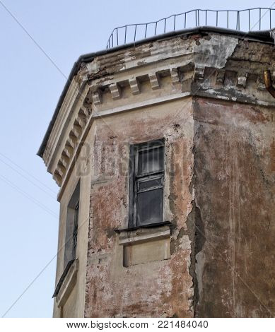 Old apartment building reconstructed in soviet era. Bay window. Old architecture. Old town