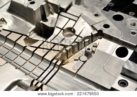 Detail part of a cast machine for background or texture.
