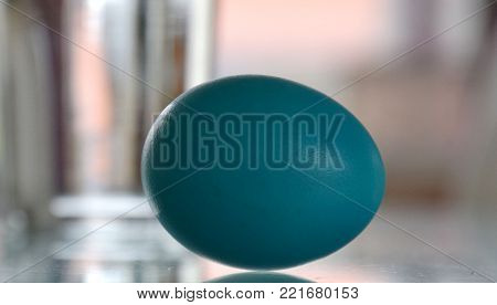 blue easter egg with abstract background for spring season