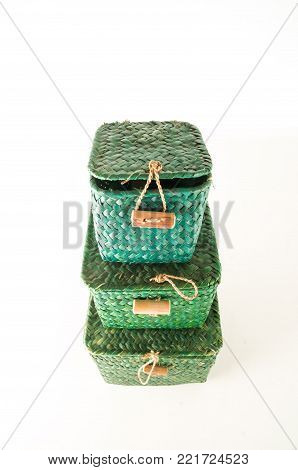 Vimini wicker boxes isolated on white background