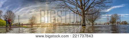 DUISBURG , GERMANY - JANUARY 08 2017 : The river Rhine is flooding the Muehlenweide in Ruhrort