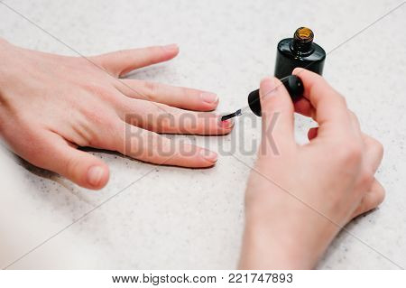 Nail primer during the procedure nail gel, Manicure arms, Good healthy nails.