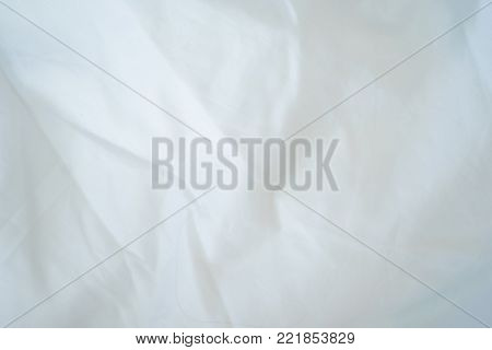 Top view of a messy bedding sheet after night sleep.